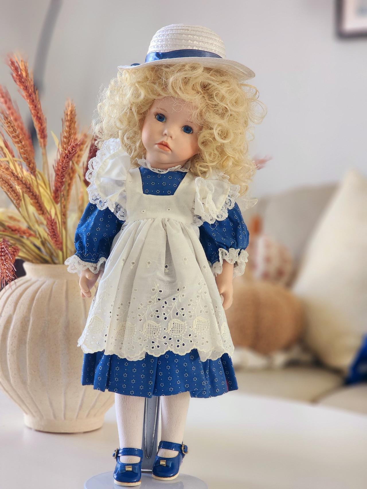 A charming 18-inch porcelain doll!