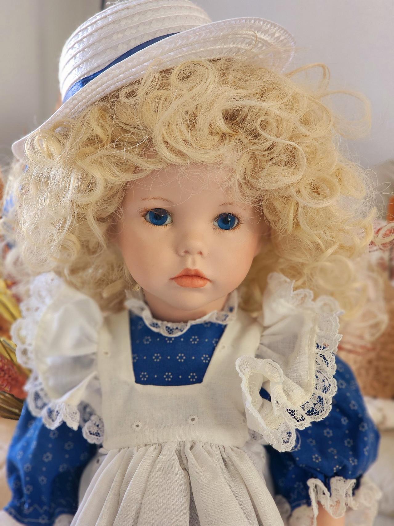 A charming 18-inch porcelain doll!