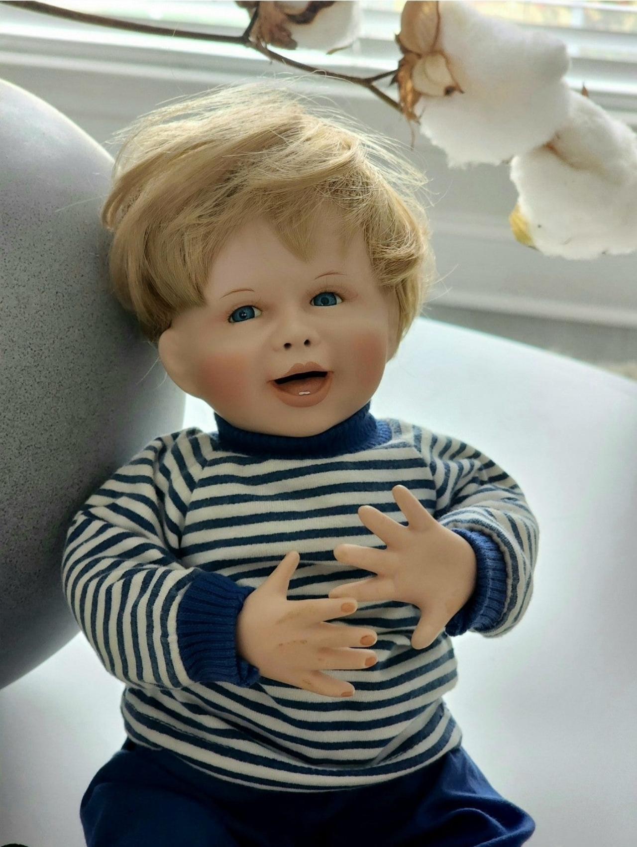 Porcelain baby boy doll