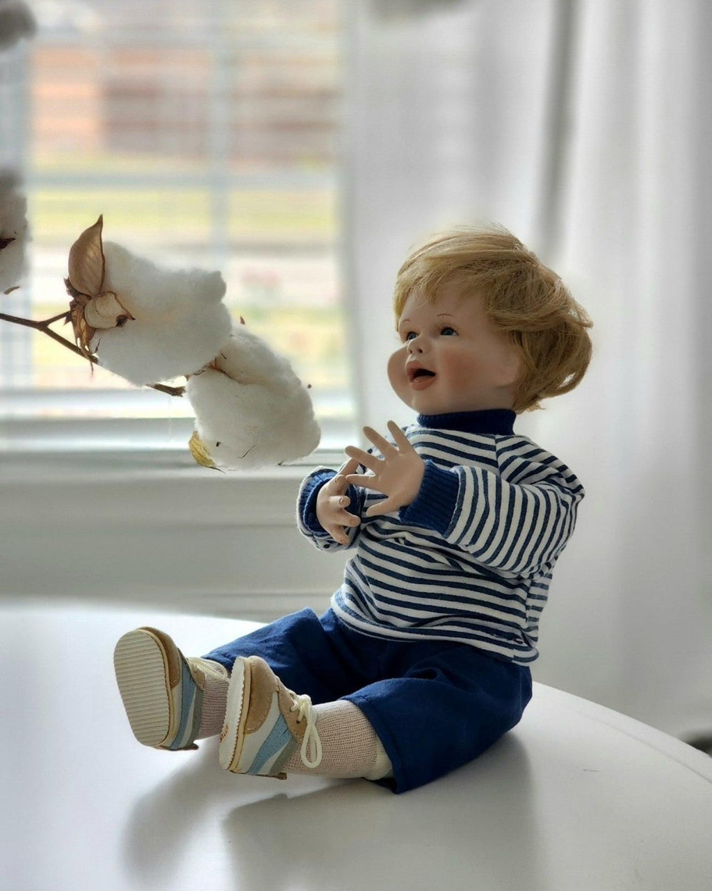 Porcelain baby boy doll